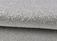 स्पार्कली फाइन पु ग्लिटर फैब्रिक इको फ्रेंडली पु सिंथेटिक मटेरियल सादा रंग आपूर्तिकर्ता